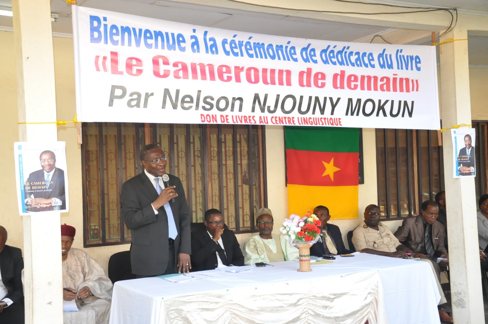 Dr. Fomunyoh giving out "The Cameroon of Tomorrow" free of charge to everyone who attended the launch