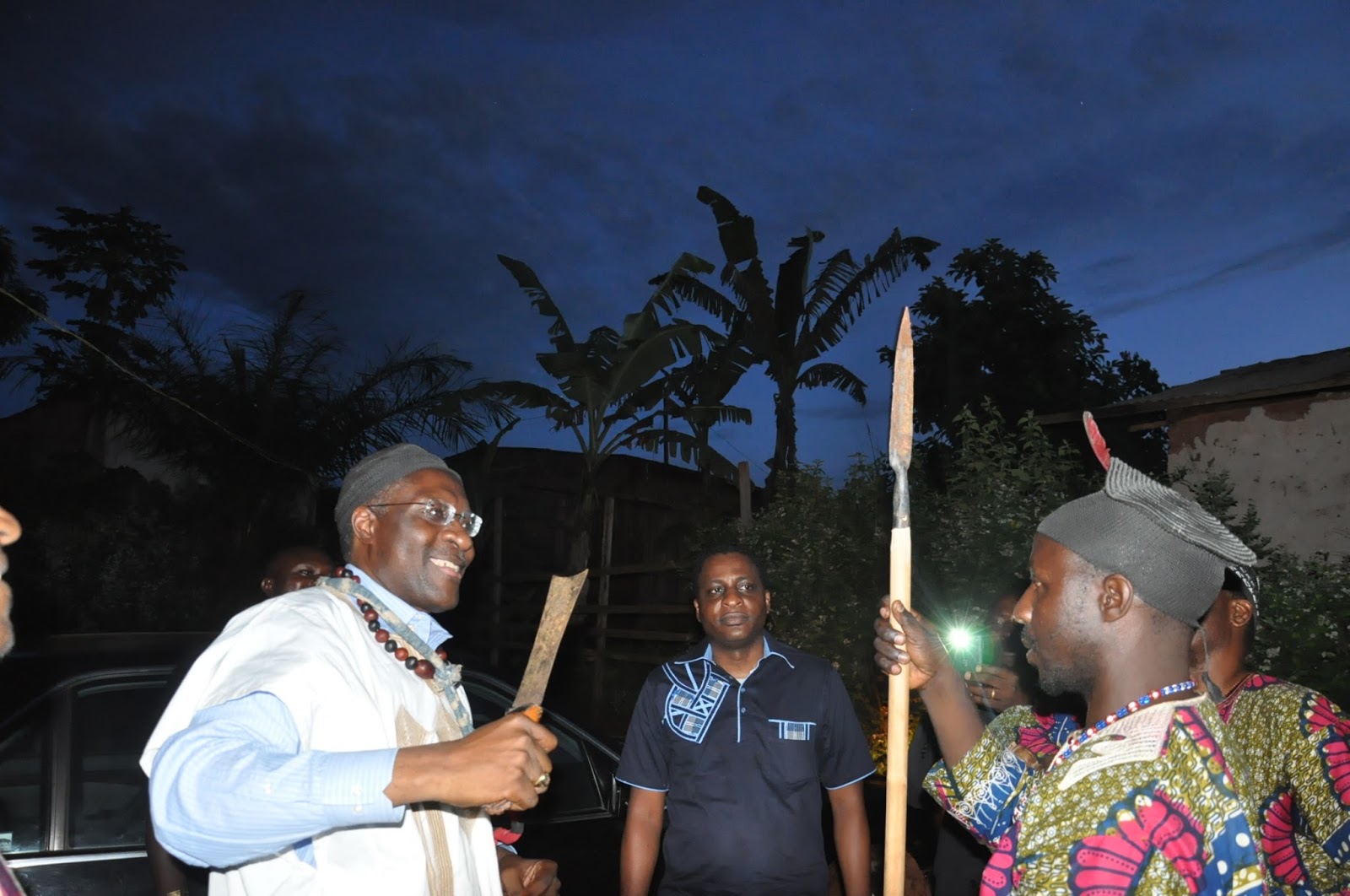Ta Nformi Bertoua (right) receiving Ta Nformi Cameroon (Dr. Fomunyoh) in the Wimbum Hall in Bertoua