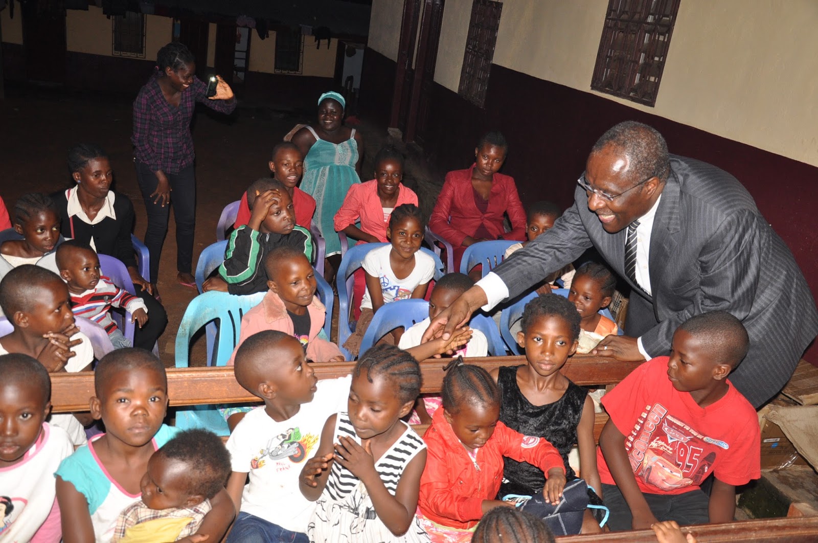 Dr. Fomunyoh greeting the orphans at "Fondation Marie France"